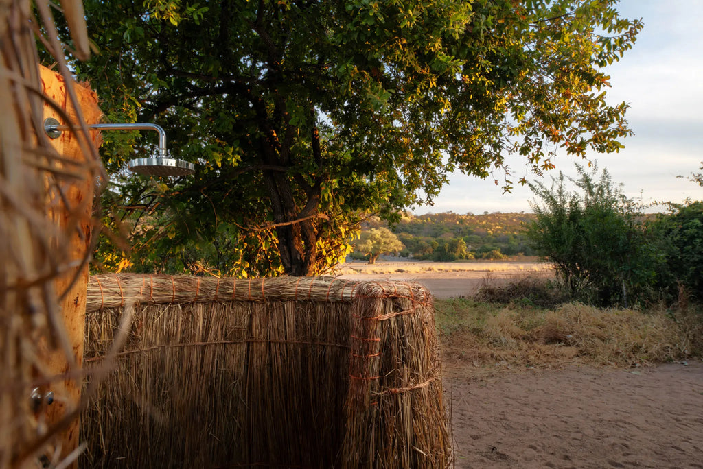 Kokoko - Outdoor Shower at Kokoko Camp, Ruaha National Park, Tanzania.