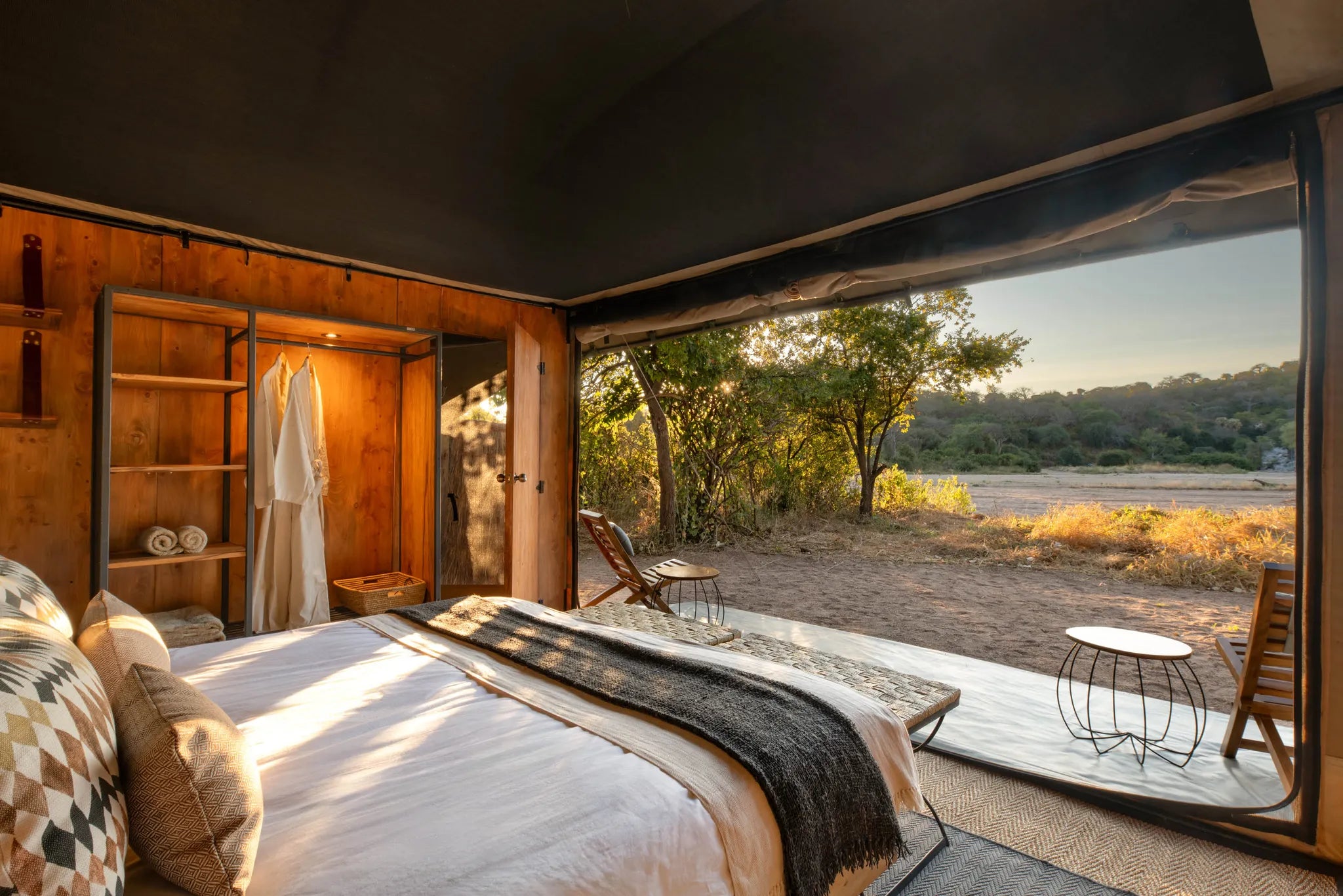 Kokoko - Tent Interior with View at Kokoko Camp, Ruaha National Park, Tanzania.