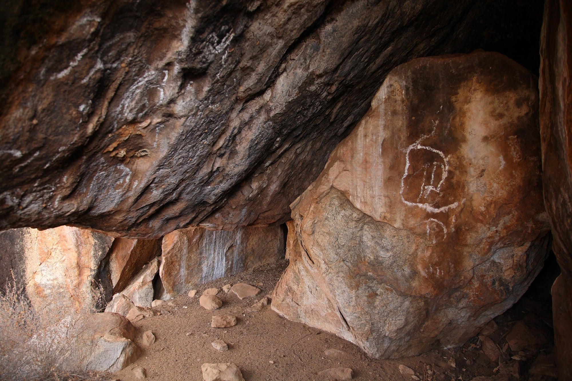Visit to local caves featuring rock art gallery image 1