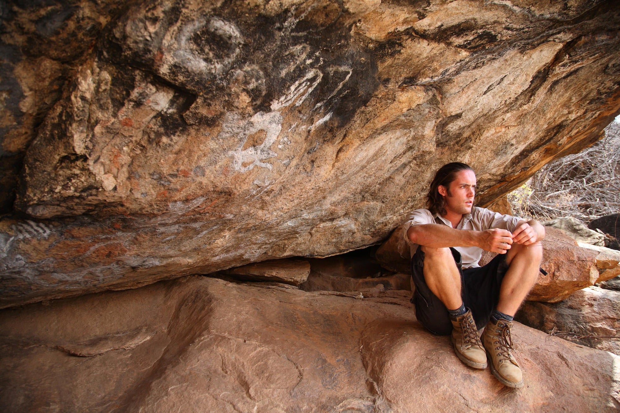 Visit to local caves featuring rock art gallery image 2