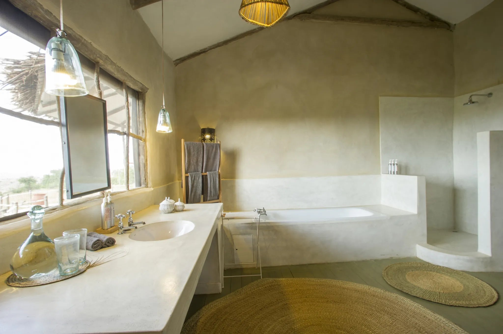 Bathroom with bath at Mkombe's House Lamai, Northern Serengeti, Tanzania.