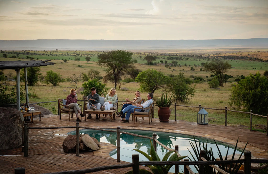 Swimming pool sundowners at Mkombe's House Lamai, Northern Serengeti, Tanzania.