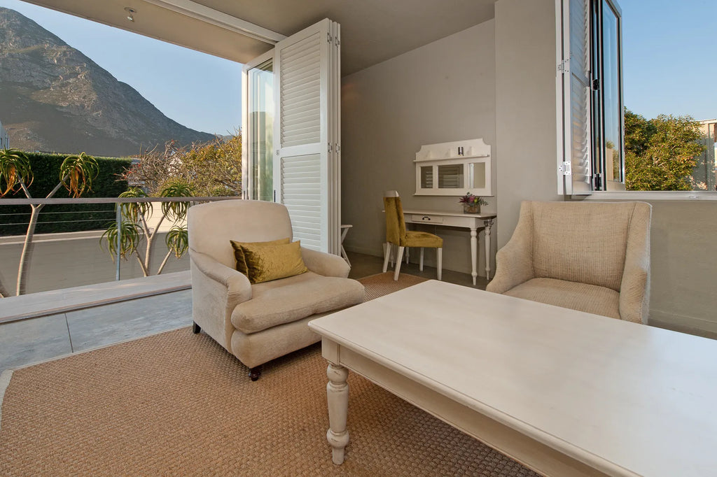 Olive deluxe room at Mosselberg on Grotto Beach, Hermanus, South Africa.