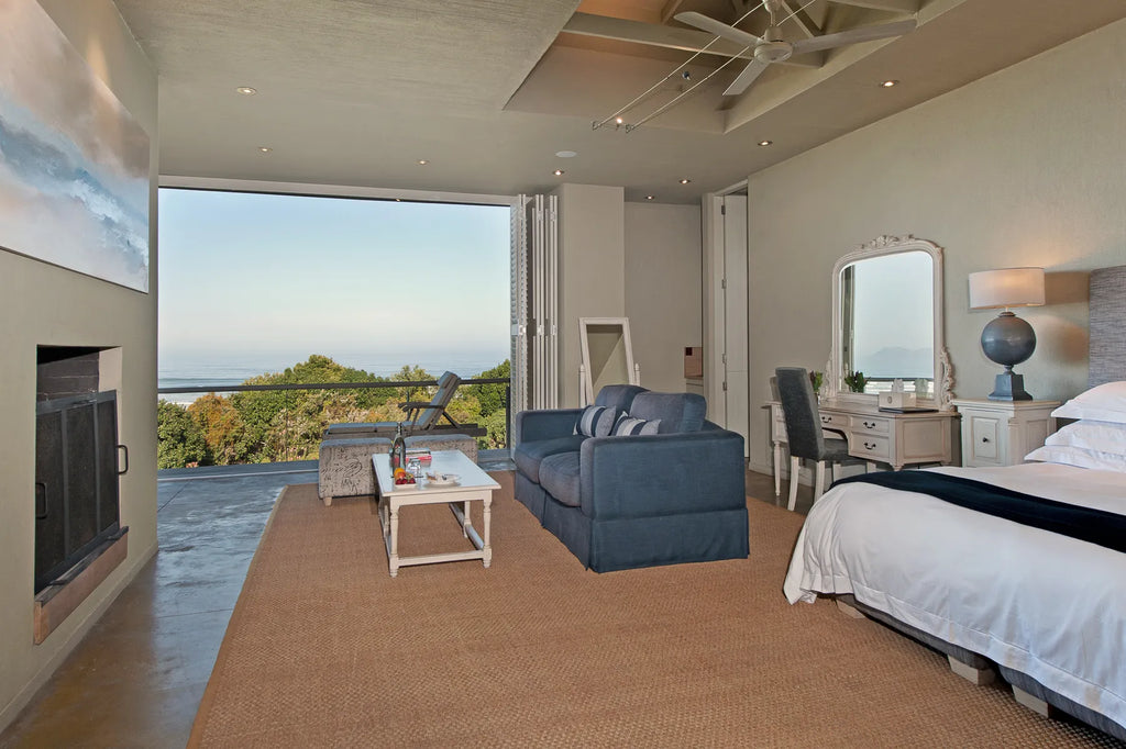 Southern right suite with Fire place seating, small kitchenette & King bed at Mosselberg on Grotto Beach, Hermanus, South ...