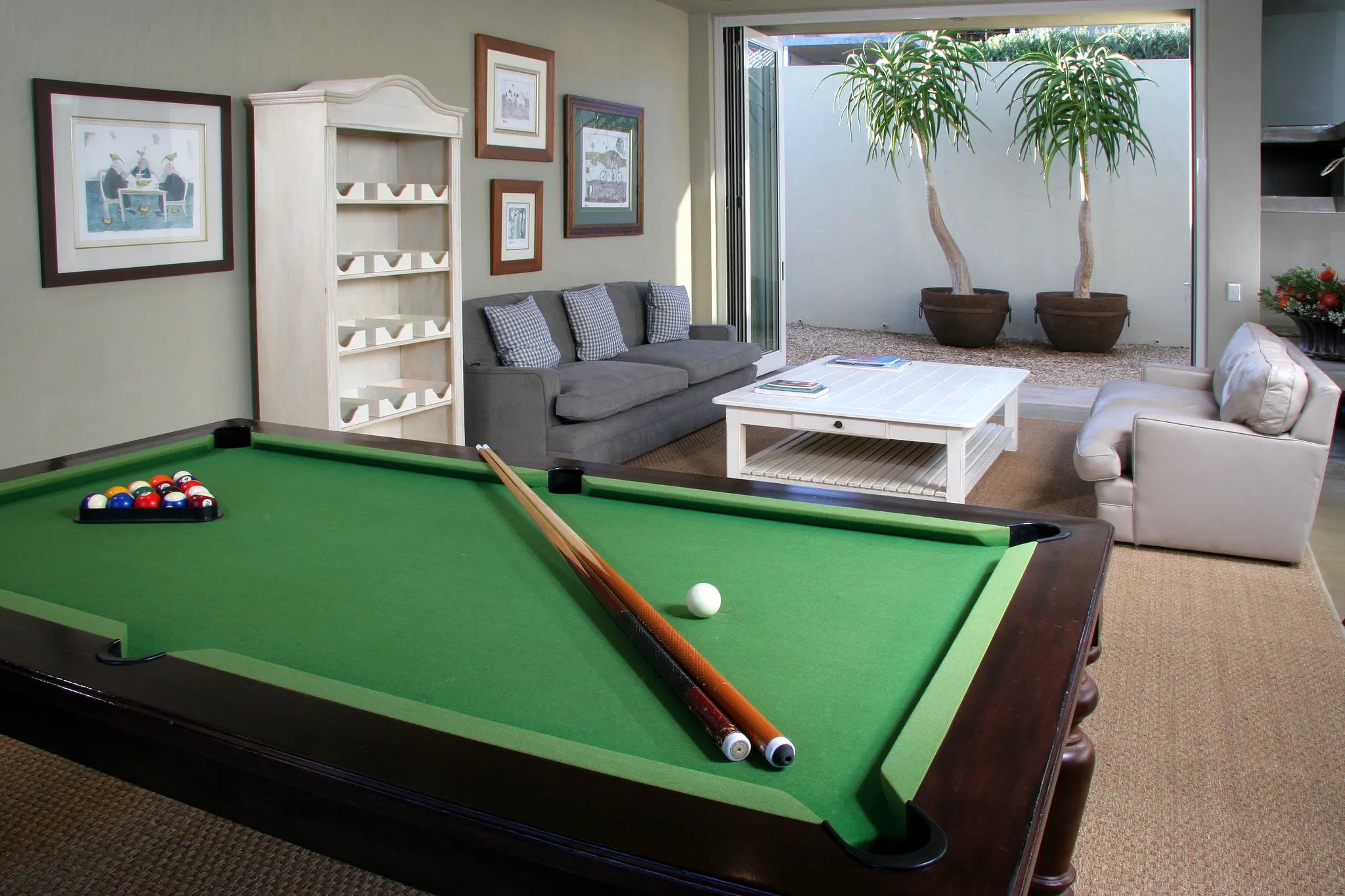 Games room with TV, DVD player, Board games & Mini Library at Mosselberg on Grotto Beach, Hermanus, South Africa.