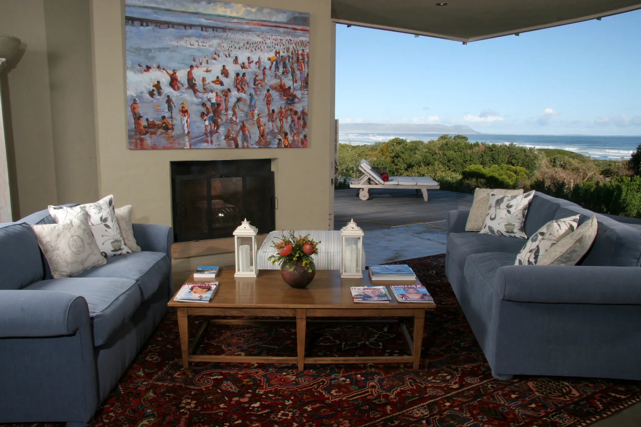 Main Lounge, overlooking our natural Fynbos garden and the ocean at Mosselberg on Grotto Beach, Hermanus, South Africa.