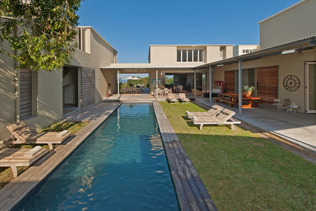 Seating in Quart yard and around Pool area at Mosselberg on Grotto Beach, Hermanus, South Africa.