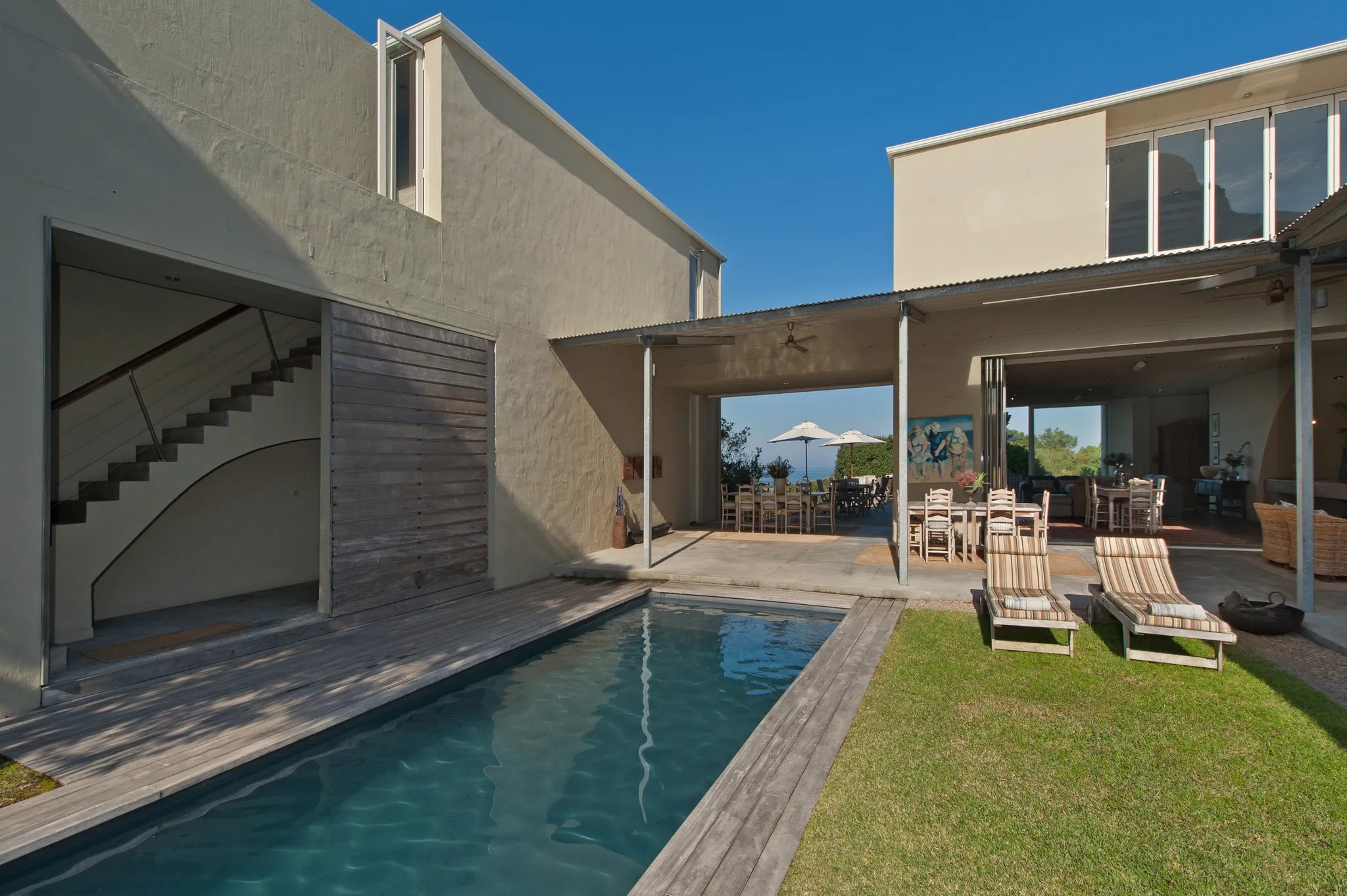 Quart yard and pool area with stairs on left going up to our Sugarbird Junior suite at Mosselberg on Grotto Beach, Hermanu...
