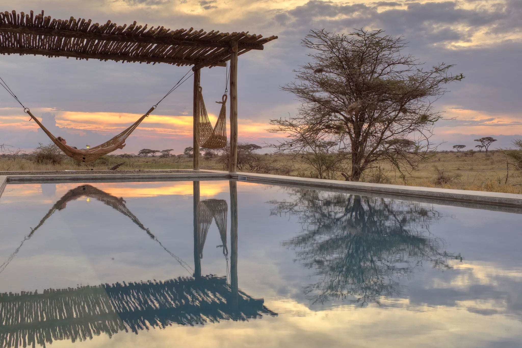 Namiri Plains - Pool Hammock with View at Namiri Plains Camp, Eastern Serengeti, Tanzania.