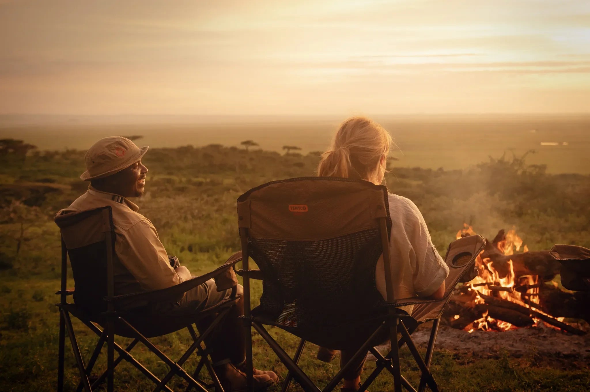 Stunning sunsets with a warming camp fire (Serengeti pictured) at Nomad Tanzania Expeditionary Walking Camp [Jul-Oct] , Ru...