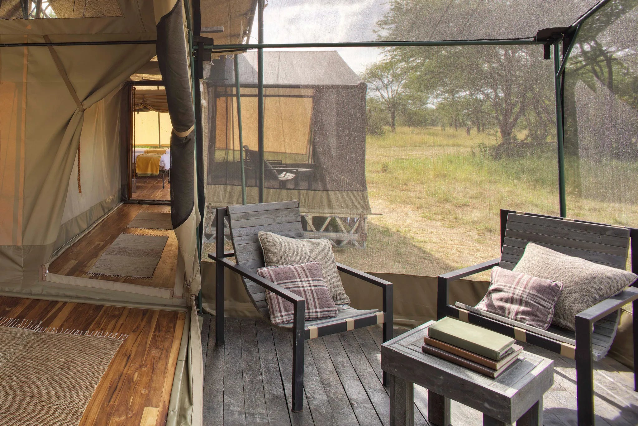 Olakira - Family room, main bedroom looking down the corridor to the additional room at Olakira Migration Camp - North (Ju...