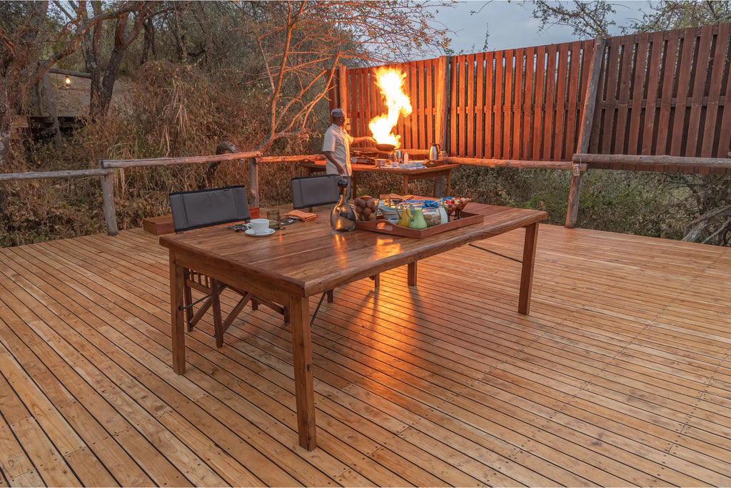 Oliver's - Private dinner for two - service at Oliver's Camp, Tarangire National Park, Tanzania.