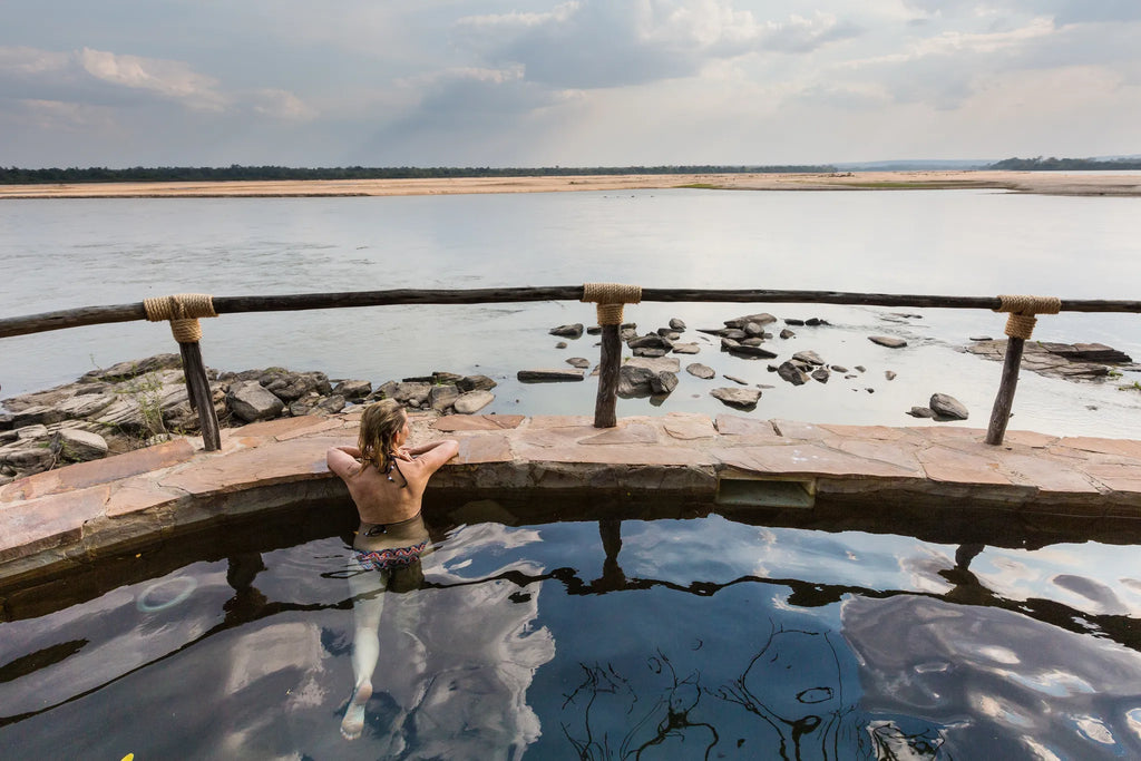 Pool overlooking the river at Sand Rivers Selous, Nyerere National Park, Tanzania.