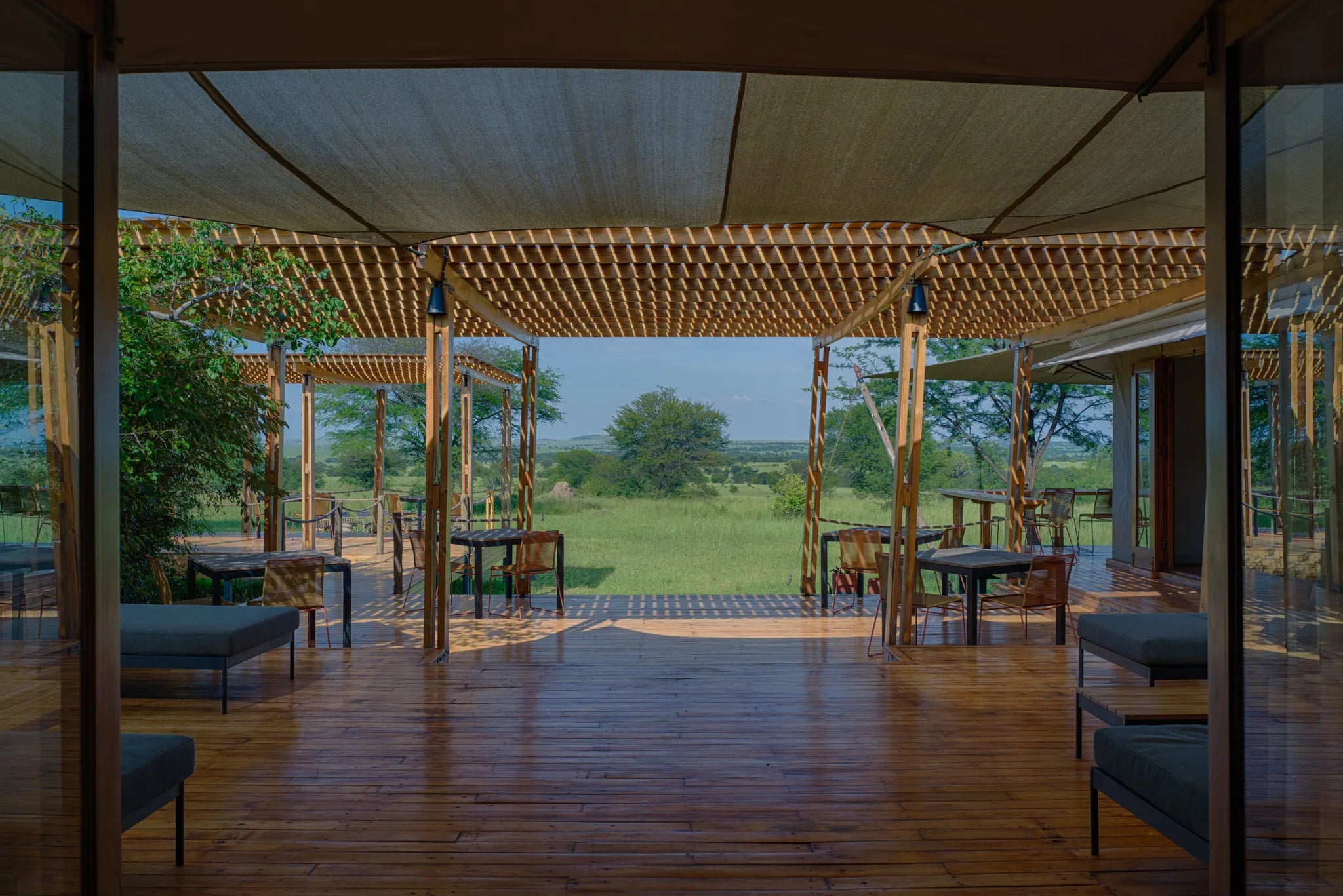Sayari - the deck from the main area with views onto the Serengeti plains at Sayari, Northern Serengeti, Tanzania.