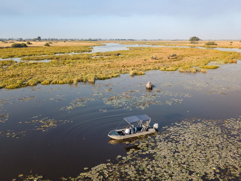 Boating at Selinda Camp at Selinda Camp, Selinda Reserve, Botswana.