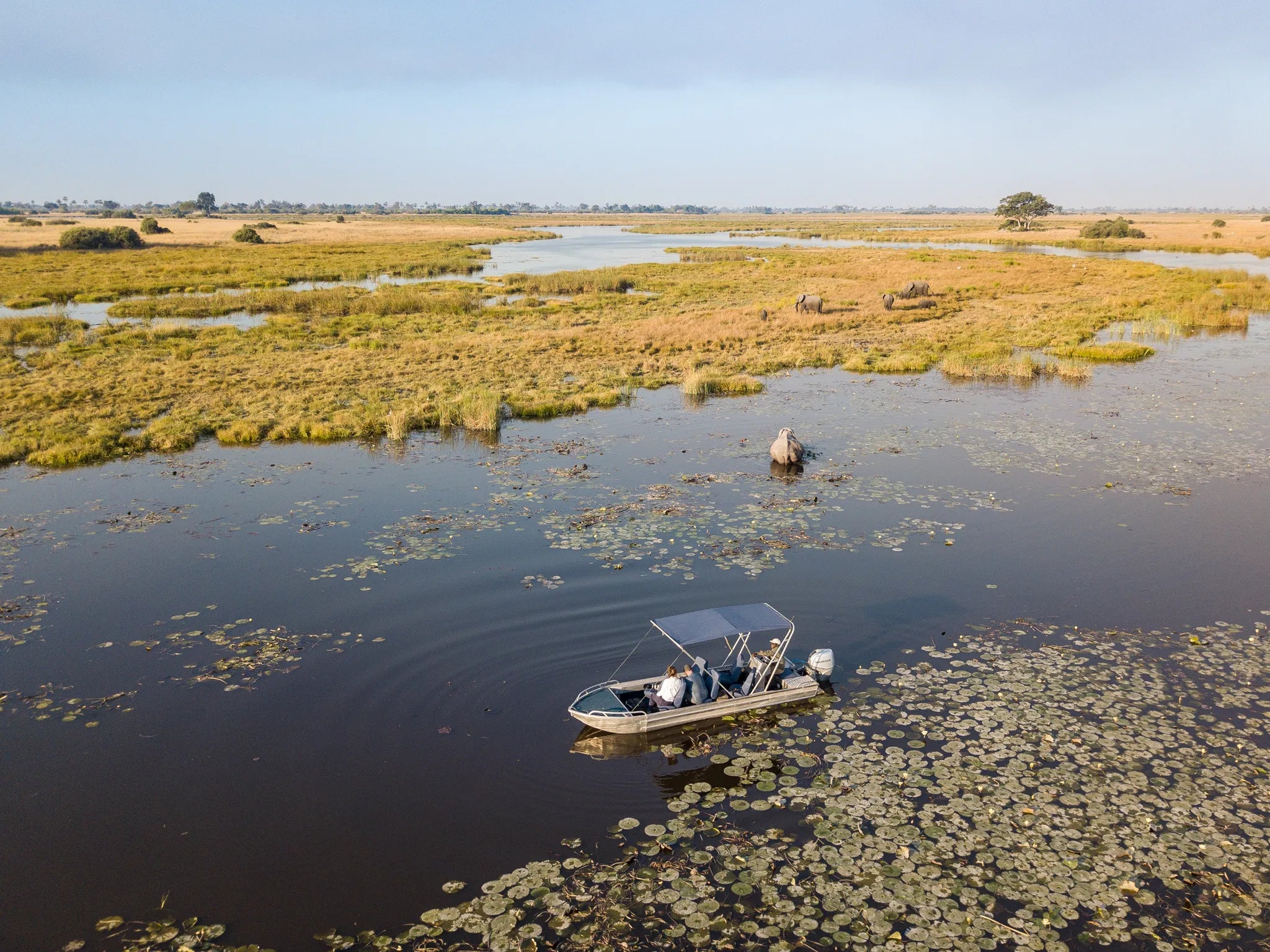 Boating at Selinda Camp at Selinda Camp, Selinda Reserve, Botswana.