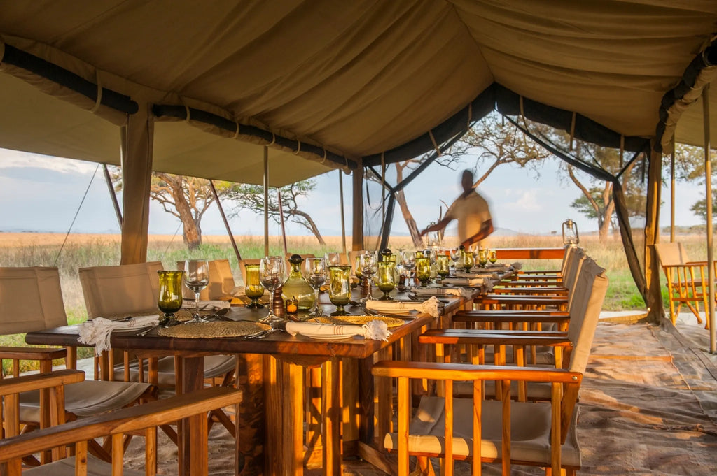 Dining at Serengeti Safari Camp North, Northern Serengeti, Tanzania.