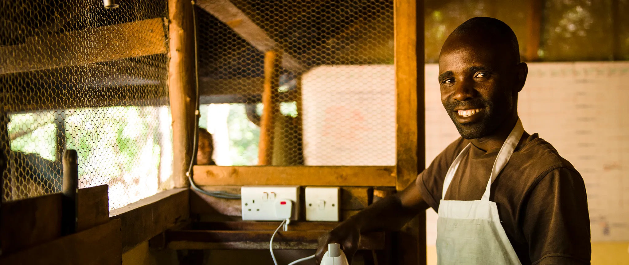 Marule preparing for dinner service at Serian The Original, Mara North Conservancy, Kenya.