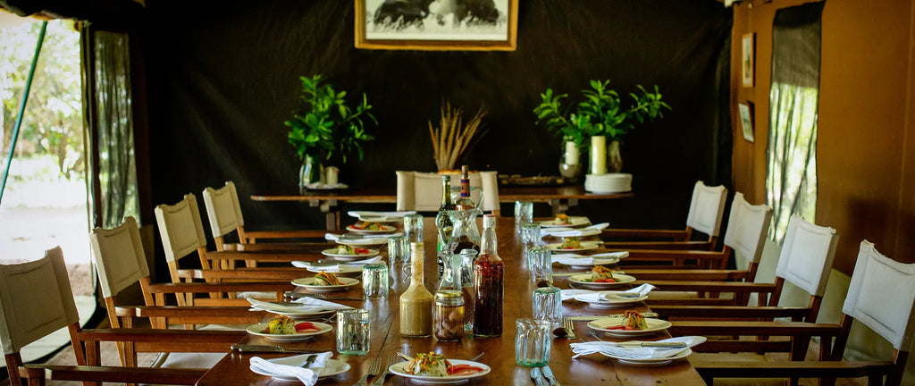 Dining en familia at Serian's Nkorombo, Masai Mara National Reserve, Kenya.