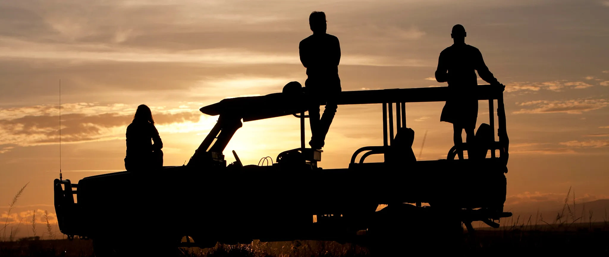 Sundowners on the plains at Serian's Nkorombo, Masai Mara National Reserve, Kenya.