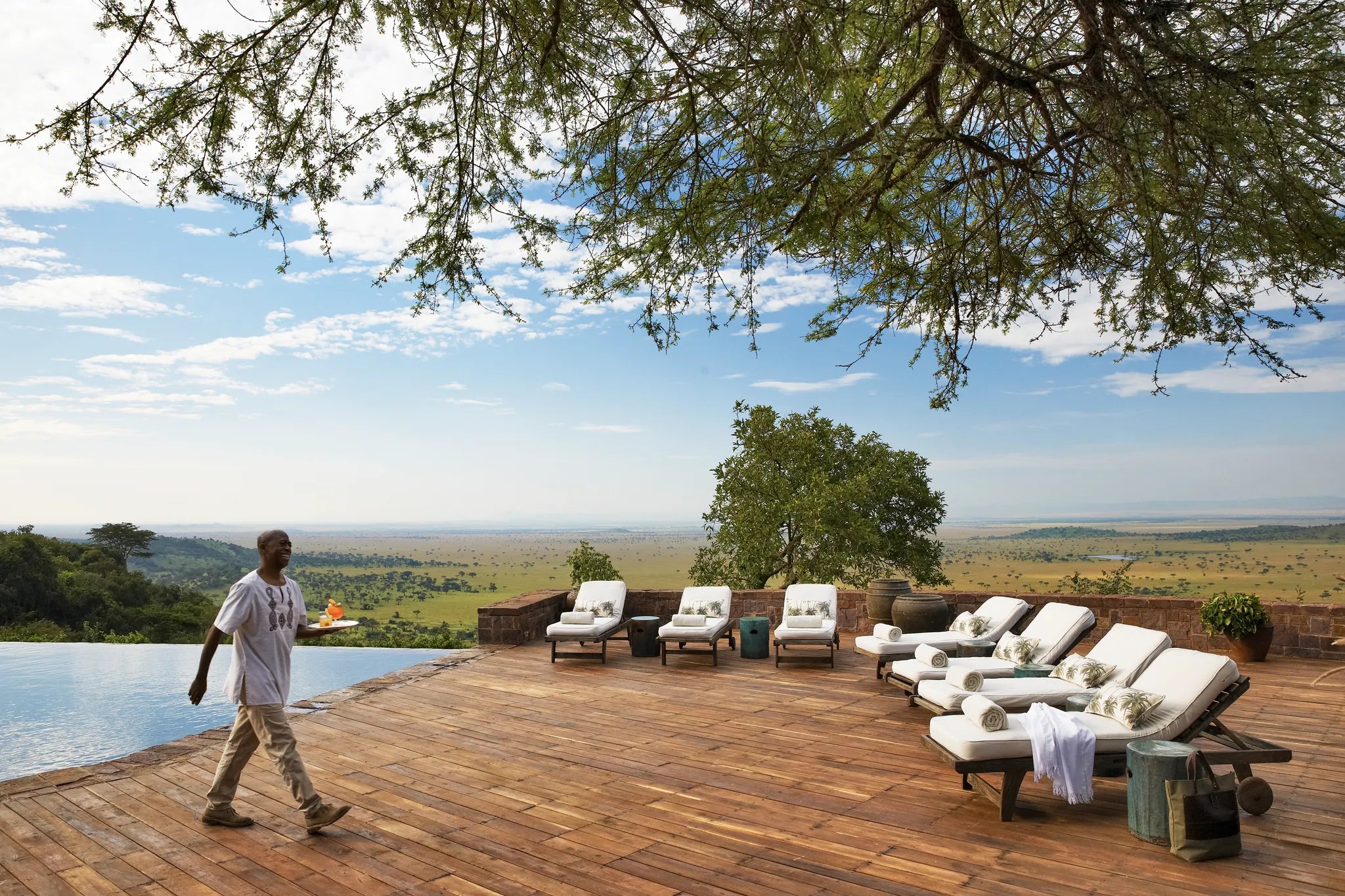 Singita Sasakwa Lodge - Poolside at Singita Sasakwa Lodge, Singita Serengeti Grumeti, Tanzania.