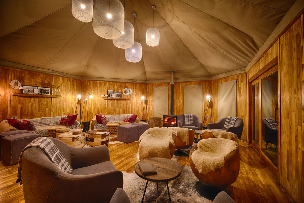 The Highlands - Cozy Lounge with Wood Burning Stove at The Highlands, Ngorongoro Crater, Tanzania.