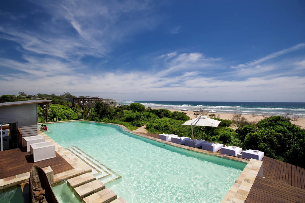 Poolside relaxation at White Pearl Resorts Ponta Mamoli, Ponta Mamoli, Mozambique.