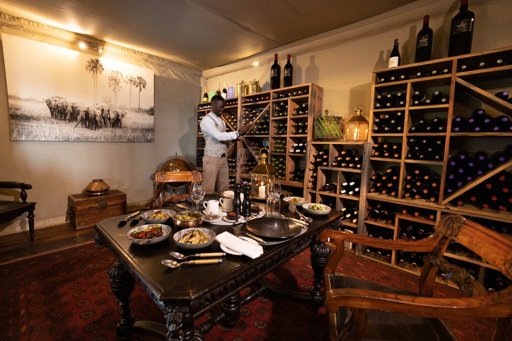 Zarafa Camp - Dinner in the wine cellar at Zarafa Camp, Selinda Reserve, Botswana.