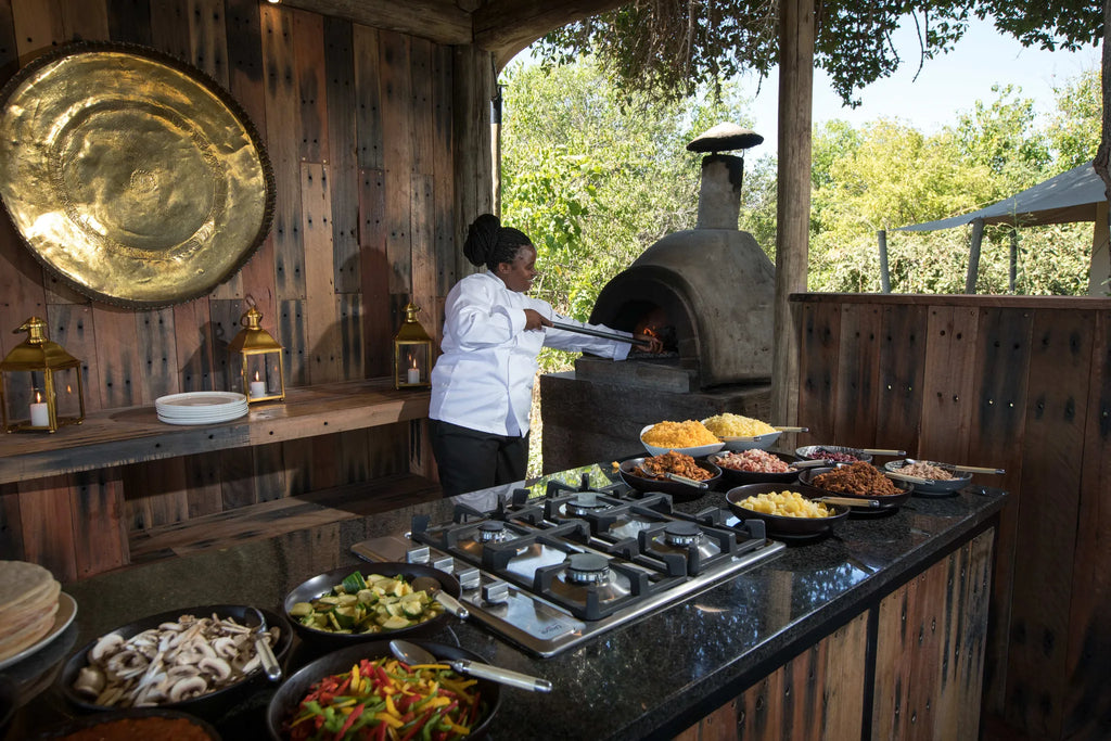 Zarafa Camp - Freshly made pizza at Zarafa Camp, Selinda Reserve, Botswana.