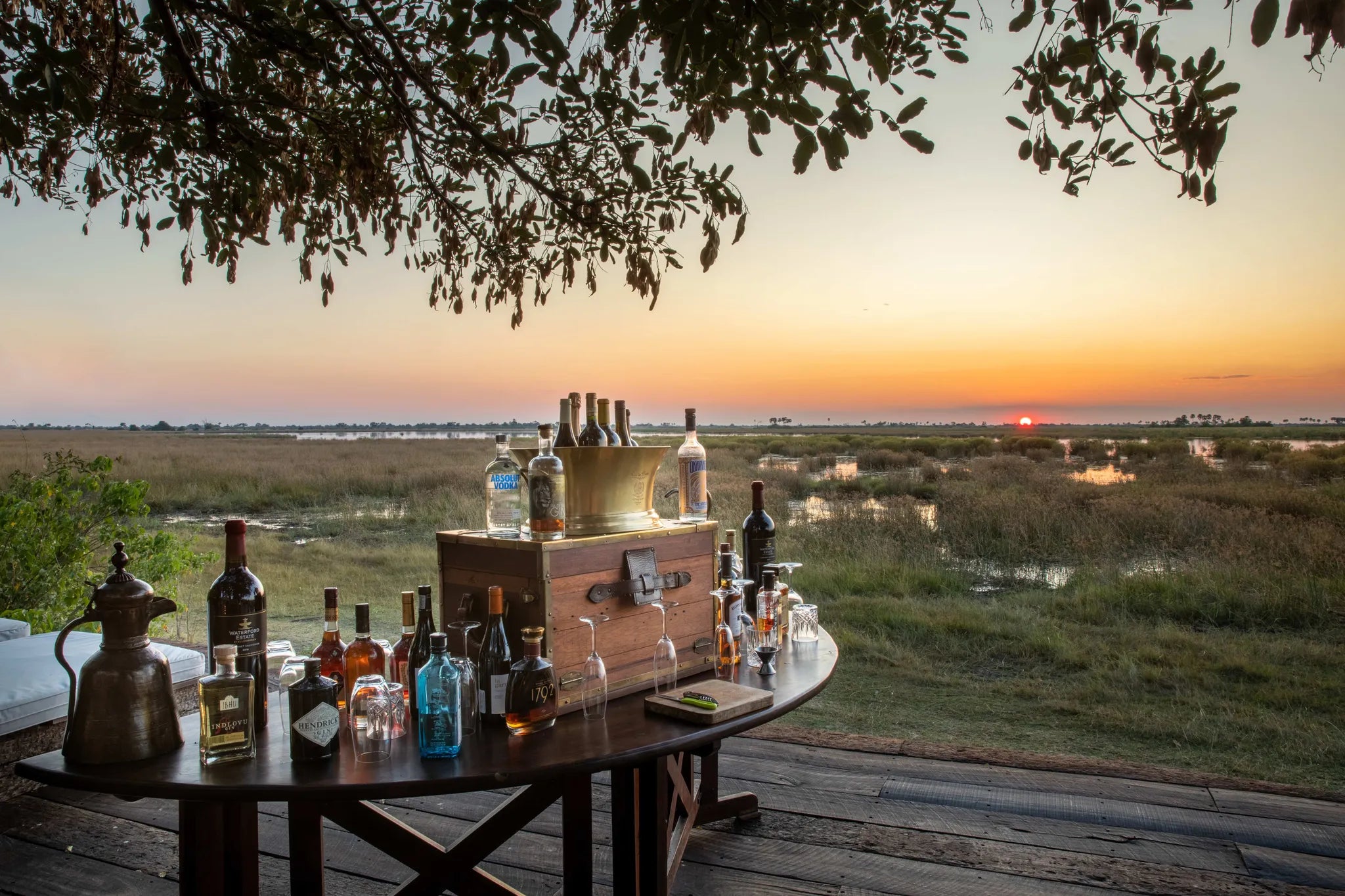 Zarafa Camp - Sunset drinks setup at Zarafa Camp, Selinda Reserve, Botswana.